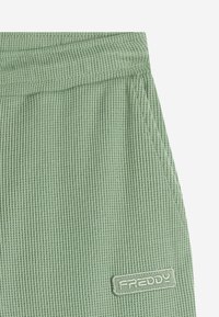 Freddy JOGGERS - Pantalones deportivos - hedge green