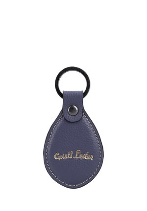 Llavero de cuero azul en forma de lágrima con costuras blancas y anilla metálica, con texto dorado en relieve "Gusti Leder".