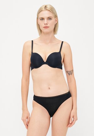 Black padded bra with adjustable straps, smooth texture, and plunging neckline. Paired with black cotton panties featuring lace trim.