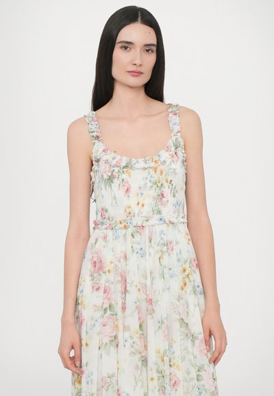 Bloemen maxi-jurk met een aansluitende lijfje, rimpelbandjes en een vloeiende rok. Zachte pastelkleuren met een patroon van rozen en wilde bloemen.