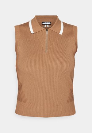 Gilet en tricot côtelé sans manches couleur sable avec col bordé de blanc et courte fermeture éclair au centre devant.