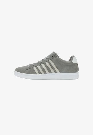Gray suede sneaker with white rubber sole, featuring three white stripes on the side, round toe, and padded collar. Laced design.