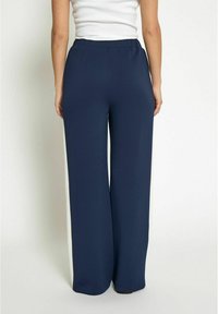 PEPPERCORN Tracksuit bottoms - black iris