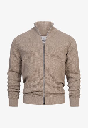 Barna cipzáras pulóver texturált mintázattal, bordás nyakkal és mandzsettával. Fekete cipzár és kötött kialakítás jellemzi.