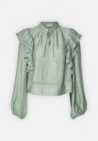 Blouse longue à manches vert clair avec des détails froncés aux épaules, des insertions en dentelle, des poignets froncés et un lien au niveau du col.