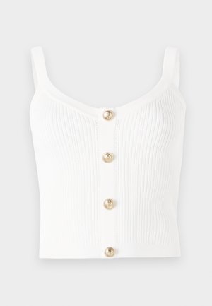 Débardeur en tricot côtelé blanc avec un décolleté en scoop et cinq boutons dorés au centre. Texture lisse avec des bretelles fines.