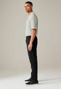 Next SUMMERWEIGHT COTTON - Jeans Tapered Fit - black
