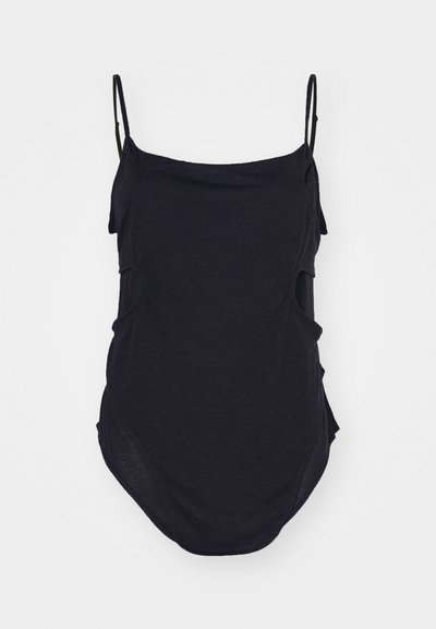 Μαύρη αμάνικη μπλούζα με λεπτές τιράντες, φτιαγμένη από μαλακό ύφασμα. Διαθέτει κρεμαστές πλευρές και στρογγυλεμένο τελείωμα για άνετη εφαρμογή.