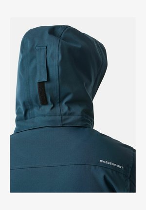 Blauwe hoodie met een gladde textuur, voorzien van een klittenbandsluiting en een witte "SWEDEMOUNT" logo op de schouder. De achterkant toont naaddetails.