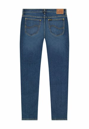 Donkerblauwe denim jeans met een slanke pasvorm, voorzien van vijf zakken, gele stiksels en een leren label op de achterkant van de tailleband.