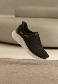 Nevybrané, black/gold-coloured