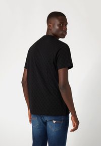Guess T-shirt basic - schwarz
