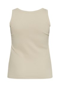 Débardeur beige, sans manches, fabriqué en tissu côtelé, avec un col rond et une silhouette ajustée, sans motifs ni éléments métalliques visibles.