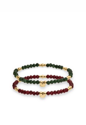 Two beaded bracelets featuring alternating dark green and red faceted beads with small gold spherical accents and gold brand tags.