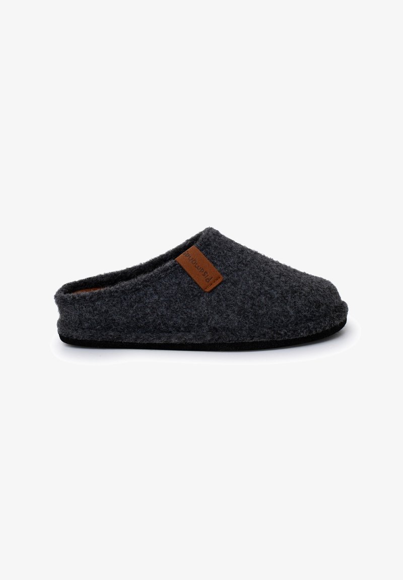 Pantofola in feltro di lana grigio scuro con punta arrotondata, texture morbida e un'etichetta in cuoio marrone sul lato. Suola nera piatta per uso interno.