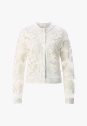 Valge kardigan lillemustriga tikandiga, soonikkoelise krae ja mansettidega, nööpidega kinnituv ning tekstuurse kangaga, millel on keerukad detailid.