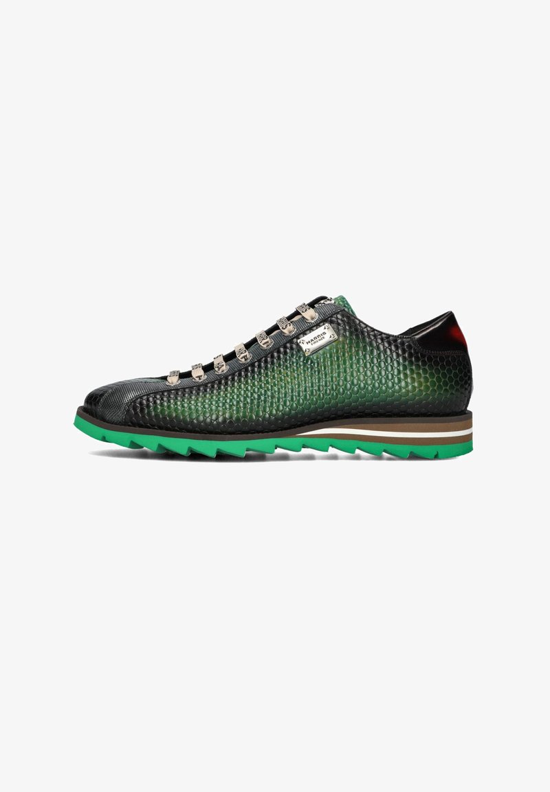 Black and green sneaker with a textured mesh upper, silver hardware, and a green rubber sole featuring a zigzag pattern.