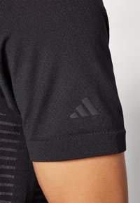adidas Golf TOUR STRIPE - Polo shirt - black
