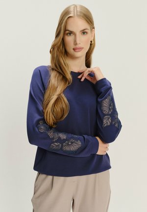 - Bluza