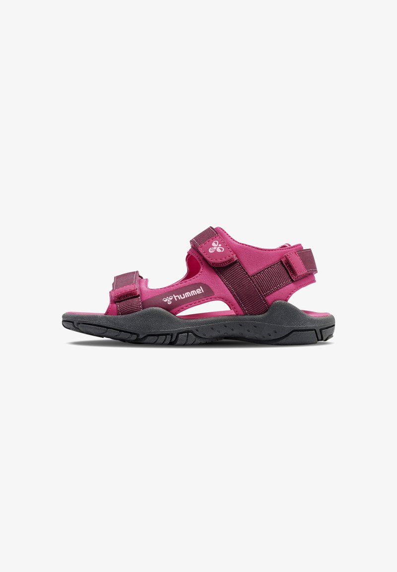 Rosa Outdoor-Sandalen mit verstellbaren Riemen, gepolstertem Fußbett und strukturierter schwarzer Gummisohle. Leicht und offen gestaltet.