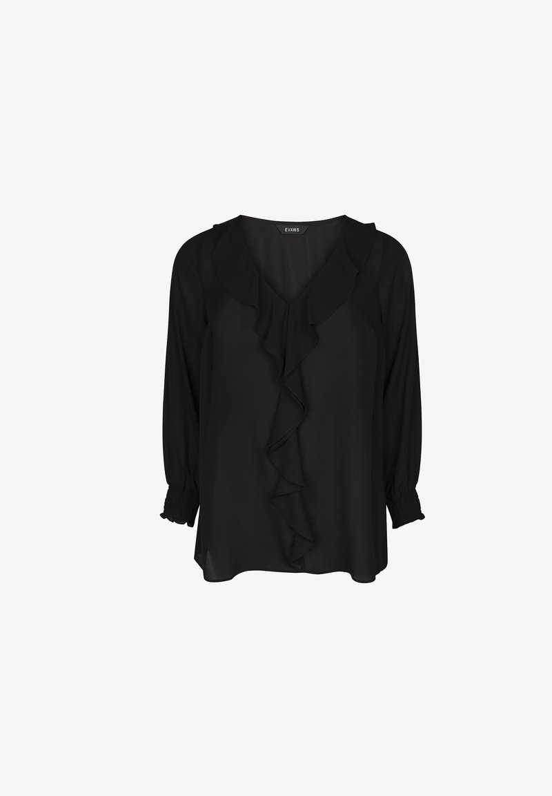 Musta pusero, jossa on pitkät hihat, V-kaula-aukko ja röyhelöity edusta. Valmistettu kevyestä kankaasta, jossa on rypytetyt hihansuut mukavan istuvuuden takaamiseksi.