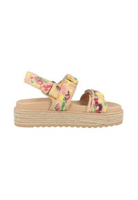 Vävda tygsandaler med färggårdigt blommönster, beige bas, justerbara remmar och en plattformssula som liknar jute.