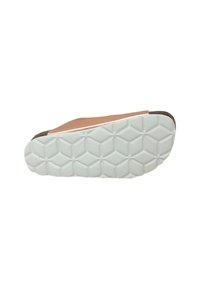 Calzature con una parte superiore liscia color tan, tacco textured marrone a contrasto e una suola in gomma bianca con motivo esagonale.