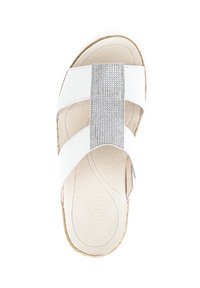 White slide sandal with a textured silver strap, foam footbed, and cork sole. Features crisscross design with a smooth finish.