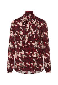 Long-sleeve blouse in red and white geometric pattern with a bow tie at the neckline, made of lightweight fabric, featuring a relaxed fit.