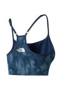 Modrá a tmavě námořnická sportovní podprsenka s úzkými nastavitelnými ramínky a bílým logem The North Face na zádech.