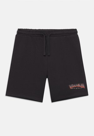 Pantaloni corti neri in cotone con vita elasticizzata e coulisse. Presenta un design del logo testurizzato sulla gamba sinistra.