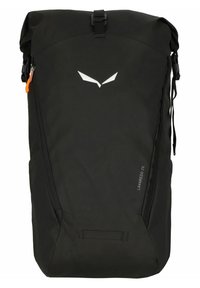 Black backpack with roll-top closure, made of durable fabric. Features a white logo, adjustable straps, a side zipper, and pockets for storage.