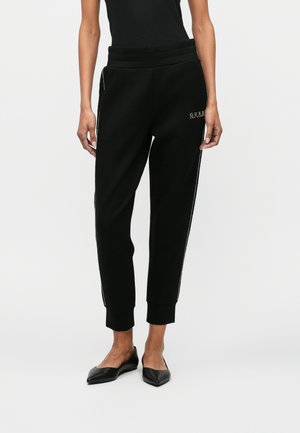 NEW VICTOIRE PANT - Pantalones deportivos - jet black