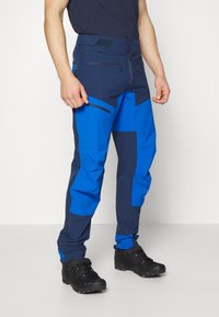 Norrøna FJØRÅ PANTS - Calças de ciclismo - indigo night/olympian blue
