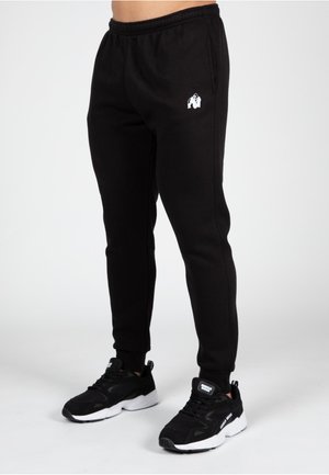 KENNEWICK - Tracksuit bottoms - black