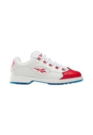 Low-top white sneaker with red toe cap, red logo on the side, white laces, and blue outsole tread visible from the side.
