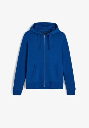 Niebieska bluza z kapturem zapinana na pełny zamek, z przednimi kieszeniami kangur, regulowanym troczkiem kaptura oraz ściągaczami na mankietach i u dołu.