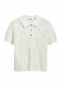 Polo shirt bianco a maglia con motivo floreale, placket a tre bottoni e maniche corte. Realizzato in materiale leggero e testurizzato.