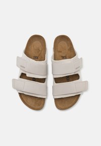 Birkenstock UJI NARROW UNISEX - Pantofole - antique white