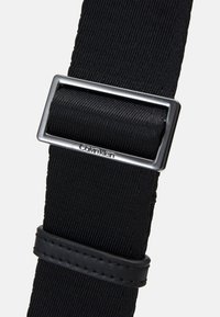 Calvin Klein VERTICAL LINES MESSENGER UNISEX - Taška cez plece - black