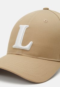 Lacoste Caps - beige