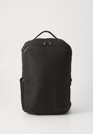 Black backpack made of durable fabric. Features a front zip pocket, side pockets, and top handle. Simple, rectangular design with logo detail.