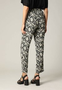 DEELUXE MANOLA - Pantalon classique - Black