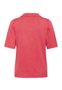 Polo à manches courtes de couleur corail, avec col et poignets côtelés, texture tricotée et ourlet droit. Vue arrière affichée.