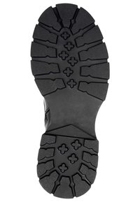 Sort gummisål med dybt mønster og multidirektionale riller for traction; har krydsformede accenter og struktureret overflade.