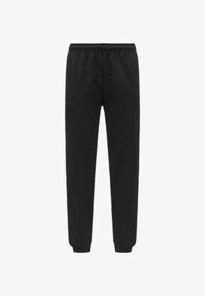 Pantaloni della tuta neri realizzati in tessuto morbido, con un elastico in vita e cordini, polsini elastici alla caviglia e una superficie liscia.