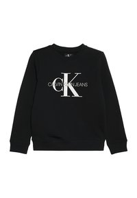 Černá mikina s dlouhým rukávem a kulatým výstřihem, se značným bílým logem "cK" a "Calvin Klein Jeans" umístěným uprostřed na přední straně.
