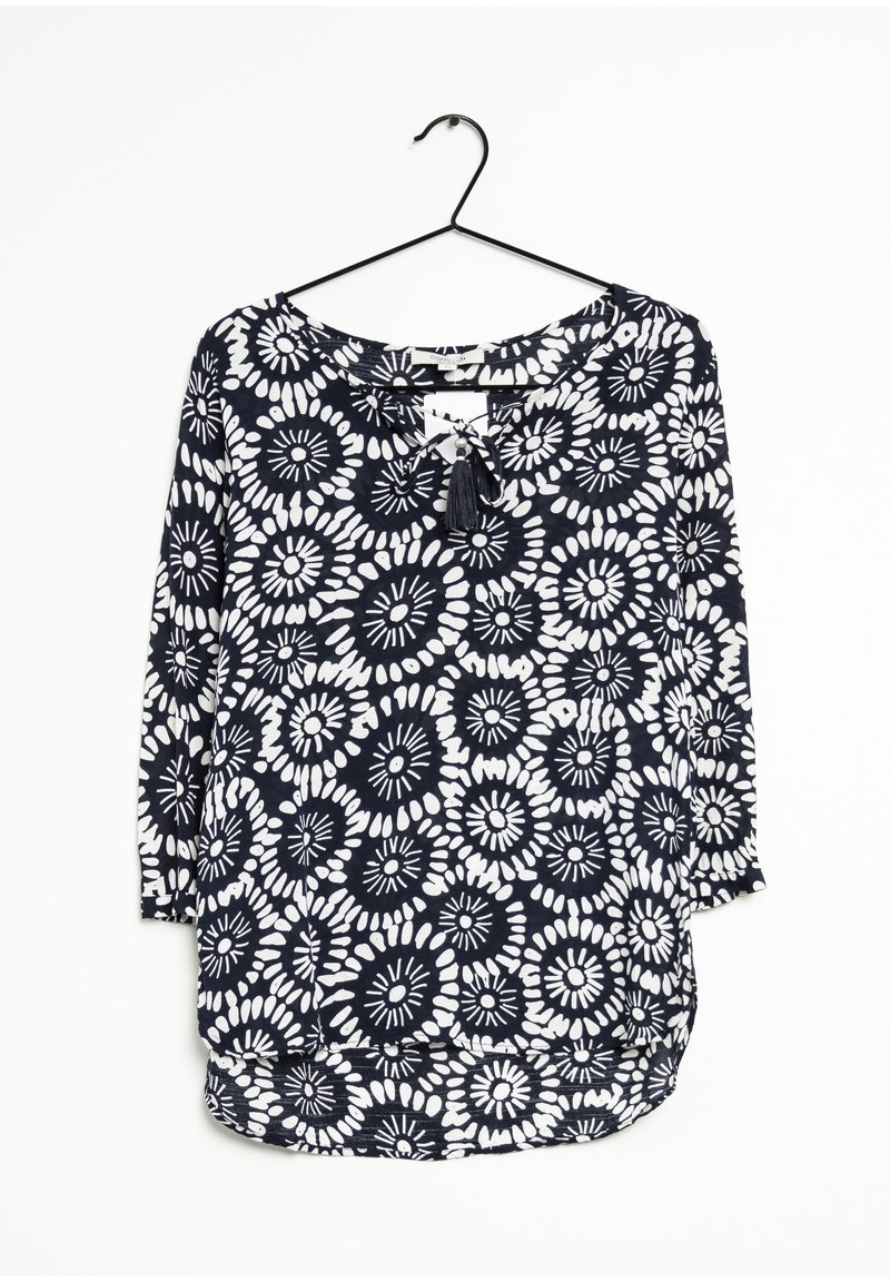 Dunkelblaue Bluse mit weißem Blumenmuster, runder Ausschnitt und 3/4-Ärmeln; verfügt über eine Bindung und einen abgerundeten Saum.