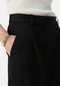 IKKS FLARED - Stoffhose - black