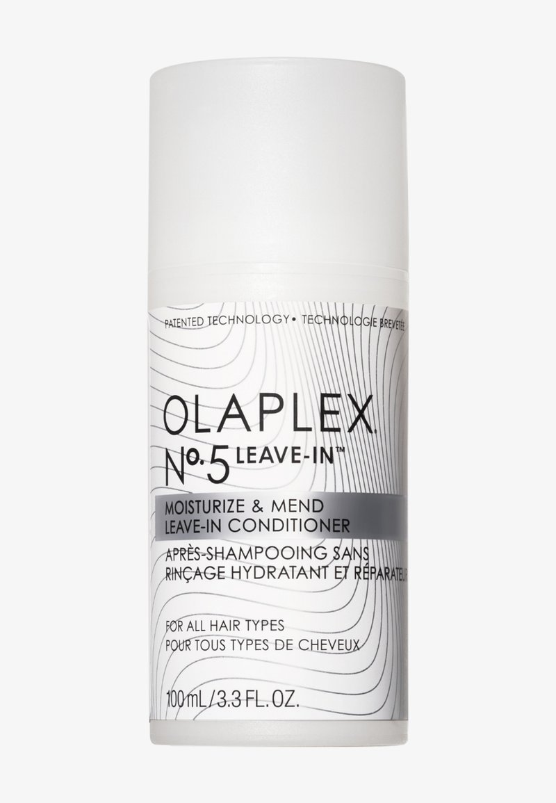 Flasche des Olaplex No. 5 Leave-In Conditioners vor weißem Hintergrund, schwarzer Schrift und wellenförmigem Design, feuchtigkeitsspendend und reparierend für alle Haartypen.
